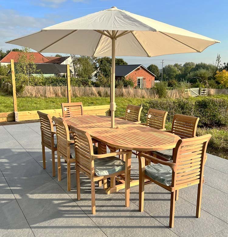 Teak garden dining set is amazing value - double extending table 1.8m to 2.4m, 8 x teak stacking chairs, free 3m parasol and cushions